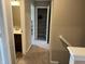 Hallway with carpet, a bathroom on the left, and a closet straight ahead at 251 Dyson Dr, Whiteland, IN 46184