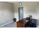 Home office with a desk, chair, and neutral wall colors at 251 Dyson Dr, Whiteland, IN 46184