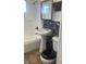 Clean bathroom with pedestal sink, shower, and bathtub at 2610 W 18Th St, Anderson, IN 46011