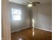 Bedroom with hardwood floors and a ceiling fan at 2610 W 18Th St, Anderson, IN 46011