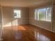 Living room with hardwood floors and neutral walls at 2610 W 18Th St, Anderson, IN 46011