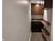 Basement wet bar with dark wood cabinets at 2815 E 23Rd St, Indianapolis, IN 46218