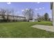 Backyard with a shed, large lawn, and patio area at 297 Van Buren St, Greenfield, IN 46140
