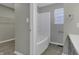 Clean bathroom featuring a shower/tub combo and linen closet at 297 Van Buren St, Greenfield, IN 46140