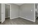 Bright bedroom featuring grey walls and vinyl flooring at 297 Van Buren St, Greenfield, IN 46140