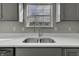 Clean kitchen sink with a modern faucet and white countertop at 297 Van Buren St, Greenfield, IN 46140