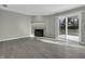 Spacious living room featuring a fireplace and hardwood floors at 297 Van Buren St, Greenfield, IN 46140