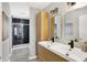 Modern bathroom with double vanity and a walk-in shower at 3015 Olive Branch Rd, Greenwood, IN 46143