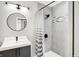 Updated bathroom with a shower and striped curtain at 3015 Olive Branch Rd, Greenwood, IN 46143