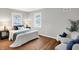 Bright bedroom with hardwood floors, new paint, and ample natural light at 3015 Olive Branch Rd, Greenwood, IN 46143
