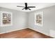 Spacious bedroom with hardwood floors and ceiling fan at 3015 Olive Branch Rd, Greenwood, IN 46143