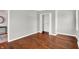 Spacious bedroom with hardwood floors and a large closet at 3015 Olive Branch Rd, Greenwood, IN 46143