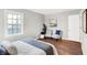 Comfortable bedroom with hardwood floors and plenty of natural light at 3015 Olive Branch Rd, Greenwood, IN 46143