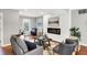 Spacious living room with hardwood floors, fireplace, and ample natural light at 3015 Olive Branch Rd, Greenwood, IN 46143