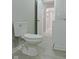 Basement bathroom with toilet and door to hallway at 3153 N Layman Ave, Indianapolis, IN 46218