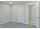 Comfortable bedroom with gray carpet and white doors at 3153 N Layman Ave, Indianapolis, IN 46218