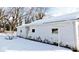 Side view of a detached garage showing some paint damage at 3153 N Layman Ave, Indianapolis, IN 46218