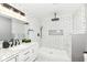 Spa-like bathroom with marble vanity and walk-in shower at 3375 Lincoln Rd, Indianapolis, IN 46222
