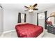 Cozy bedroom with a comfortable bed and window at 3375 Lincoln Rd, Indianapolis, IN 46222