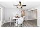 Dining area with white table and gray chairs at 3375 Lincoln Rd, Indianapolis, IN 46222