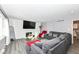 Living room features a large sectional sofa and fireplace at 3375 Lincoln Rd, Indianapolis, IN 46222