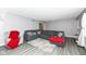 Living room with sectional sofa and red throw blanket at 3375 Lincoln Rd, Indianapolis, IN 46222