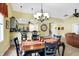 Open concept dining area with view of kitchen and living room at 4139 Bella Ct, Indianapolis, IN 46237