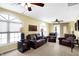 Cozy Gathering room with leather furniture and large windows at 4139 Bella Ct, Indianapolis, IN 46237