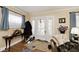 Inviting entryway with hardwood floors and coat rack at 426 N Euclid Ave, Indianapolis, IN 46201