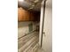 Unfinished basement with wood cabinets and vinyl flooring at 4349 Alhambra Dr, Anderson, IN 46013