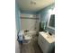 Updated bathroom with a tub shower, toilet and vanity at 4349 Alhambra Dr, Anderson, IN 46013