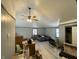 Large bedroom with light grey wood flooring and a ceiling fan at 4349 Alhambra Dr, Anderson, IN 46013
