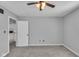 Charming bedroom with grey walls, carpet flooring and access to loft at 4450 W 300 N, Fairland, IN 46126