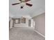 Spacious bonus room with ceiling fan and carpet flooring at 4450 W 300 N, Fairland, IN 46126