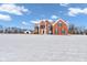 Brick house on a snowy lot with a detached garage at 4450 W 300 N, Fairland, IN 46126