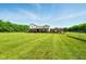 Expansive yard provides space and privacy for this charming two-story home in a serene setting at 4450 W 300 N, Fairland, IN 46126