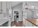 Bright kitchen with an open floor plan and a view into another room at 4450 W 300 N, Fairland, IN 46126