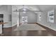 Vaulted ceilings and an open floor plan connect the kitchen and living room at 4450 W 300 N, Fairland, IN 46126