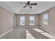 Main bedroom with carpet, multiple windows and tray ceiling at 4450 W 300 N, Fairland, IN 46126