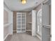 Large walk-in closet with built-in shelves and rods at 4450 W 300 N, Fairland, IN 46126