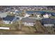 Aerial view of a beautiful neighborhood with a pond at 4667 W Meadows Ln, New Palestine, IN 46163