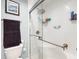 Bathroom with a shower/tub combo and grab bar at 4667 W Meadows Ln, New Palestine, IN 46163