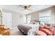 Cozy bedroom with a ceiling fan and comfortable seating at 4667 W Meadows Ln, New Palestine, IN 46163