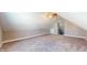 Large bonus room offering versatility, a ceiling fan, and access to upper level at 4667 W Meadows Ln, New Palestine, IN 46163