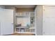 Laundry room with built-in shelving, washer, and dryer at 4667 W Meadows Ln, New Palestine, IN 46163