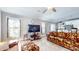 Open concept living room with kitchen views, a TV, and comfy seating at 4667 W Meadows Ln, New Palestine, IN 46163