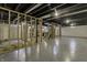 Unfinished basement with exposed framing and concrete flooring at 5201 N White Ln, Lawrence, IN 46226