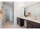 Bright bathroom featuring double vanity with quartz countertop and modern lighting at 5670 Terracotta Trce, McCordsville, IN 46055