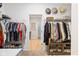 Spacious walk-in closet with custom shelving, ample storage for clothes and shoes at 5670 Terracotta Trce, McCordsville, IN 46055