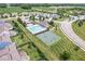 Aerial view of a community with a pool and basketball court at 6305 Primrose Dr, Whitestown, IN 46075